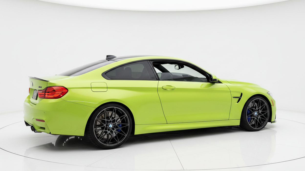 Green BMW M4 in White Showroom